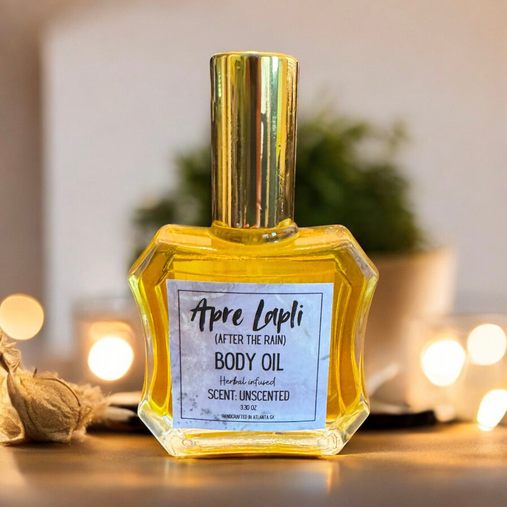 Bottle of Apre Lapli body oil on a blurred background with lights and plants
