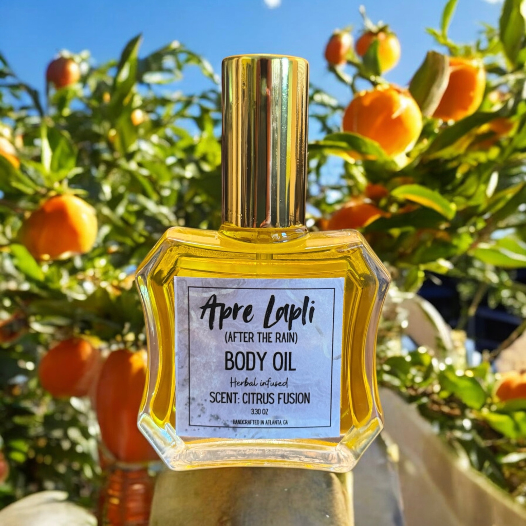 Body oil bottle labeled 'Apre Lapli' with oranges in the background